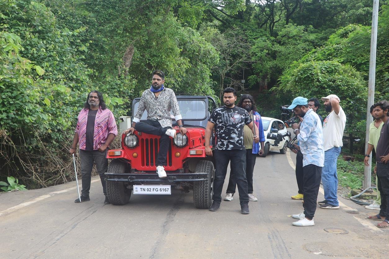 Action unit with jeep on a forest road shoot